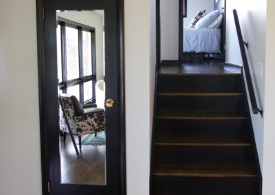 black-trim-black-stairs-white-walls