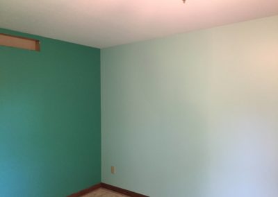 mint-colored-wall-with-darker-accent-wall