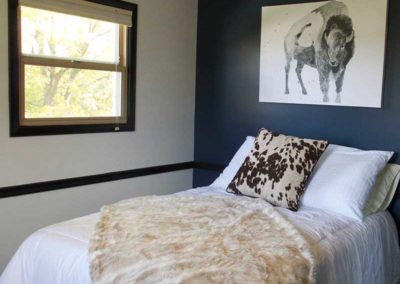 Blue Accent Bedroom Wall With Black Trim